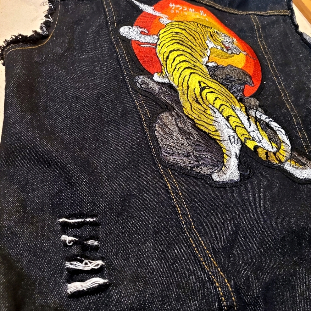 Men's distressed vest with huge tiger back patch